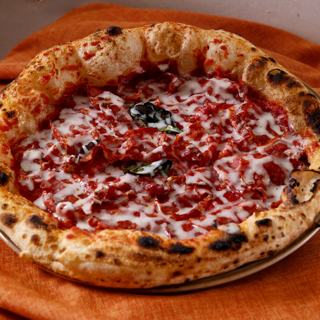 Migliore pizza contemporanea a Bologna pizza diavola con gorgonzola
